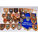 THIRTY FOUR WOODEN WALL PLAQUES RELATING TO BRITISH ARMY UNITS AND REGIMENTS, both past and present,