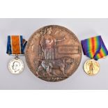 A WWI MEMORIAL DEATH PLAQUE named George Haynes, together with a British War and Victory medal named