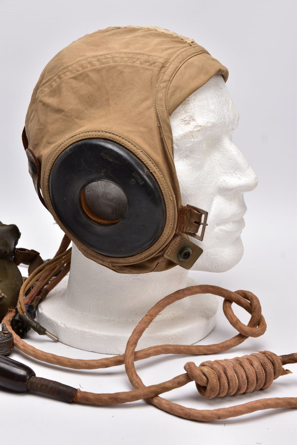 A WWII ERA USA FLYING HELMET IN BEIGE CANVAS WITH ATTACHED RADIO COMMUNICATION LEAD, the cap is by - Image 10 of 13