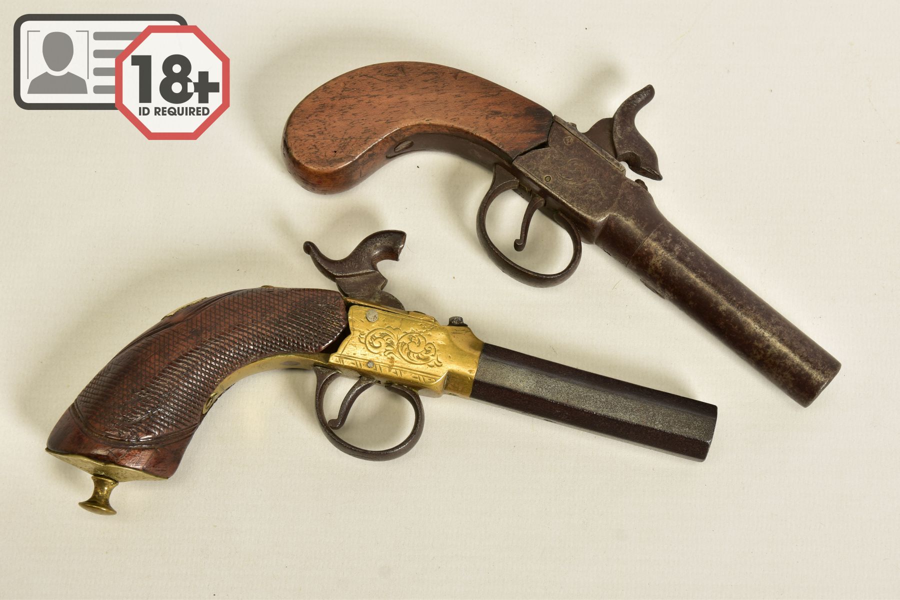 TWO ANTIQUE PERCUSSION BOXLOCK POCKET PISTOLS, the first has a round 56 bore 2¾'' screw off barrel