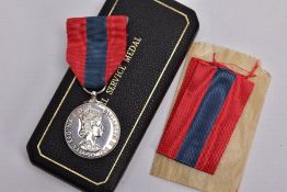 A BOXED ROYAL MINT IMPERIAL SERVICE MEDAL named to Hubert Martin, ERII Dei-Gratia 1955 version