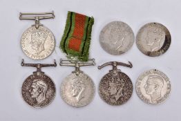 A BAG OF SEVEN WWII DEFENCE AND WAR MEDALS un-named as issued, poor condition, some missing ribbon