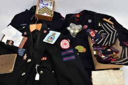 A BOX CONTAINING ITEMS OF A BRITISH RED CROSS INTEREST, two British Red Cross uniform jackets with