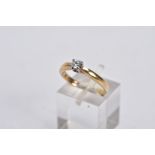 A 9CT GOLD SINGLE STONE DIAMOND RING, designed with a raised claw set, round brilliant cut