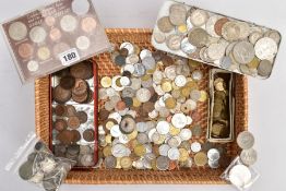 A WICKER BASKET OF MIXED COINAGE to include approximately 175 grams pre 1947 silver coins