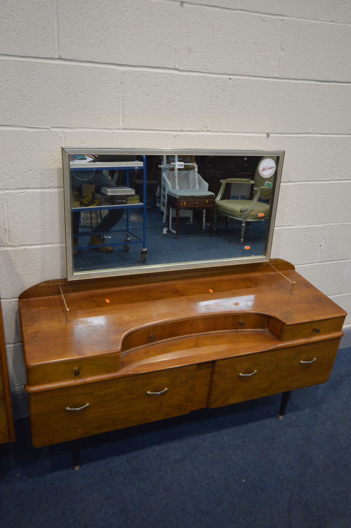 A MID 20TH CENTURY WALNUT TWO PIECE BEDROOM SUITE, comprising a dressing table (missing two caps and - Image 2 of 3