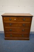 AN EDWARDIAN WALNUT CHEST OF TWO SHORT OVER THREE LONG DRAWERS, width 106cm x depth 51cm x height