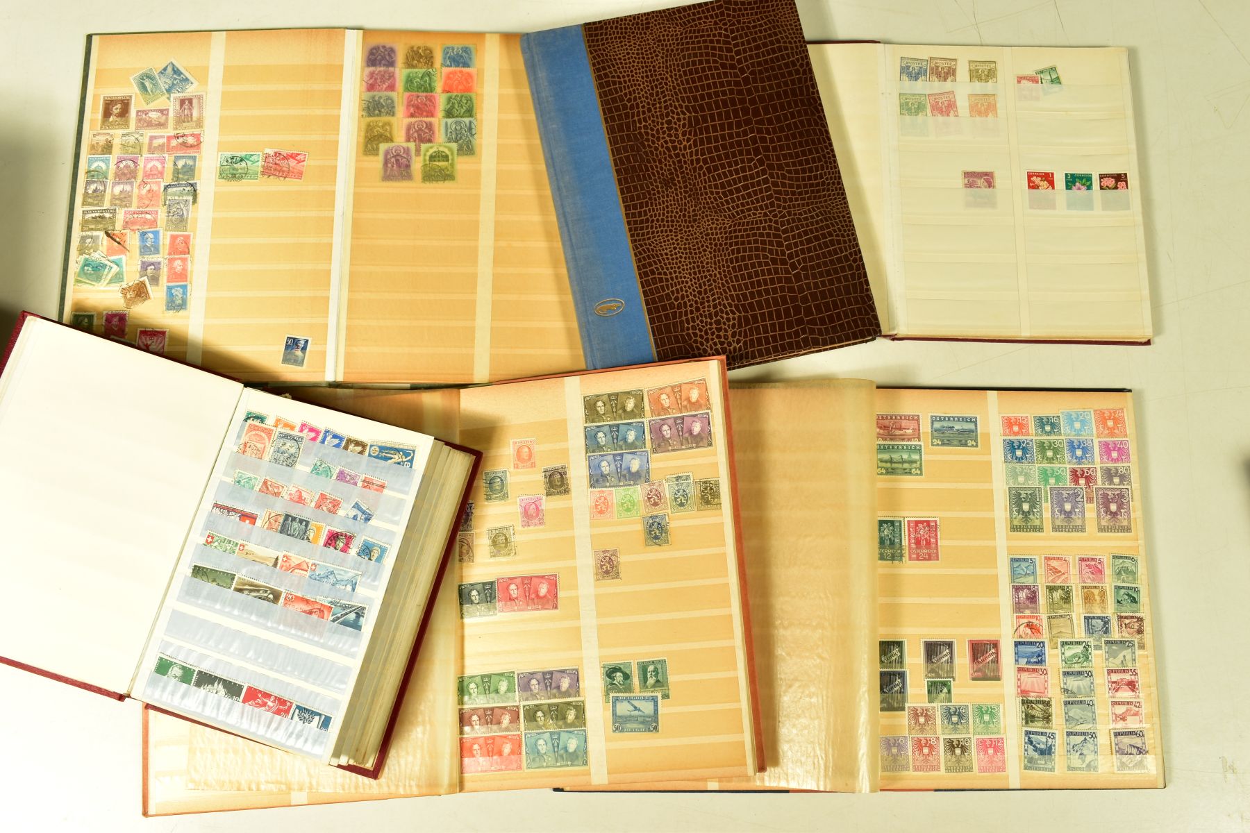 A COLLECTION OF MAINLY WESTERN EUROPEAN STAMPS in 6 albums mint and used, with some slightly