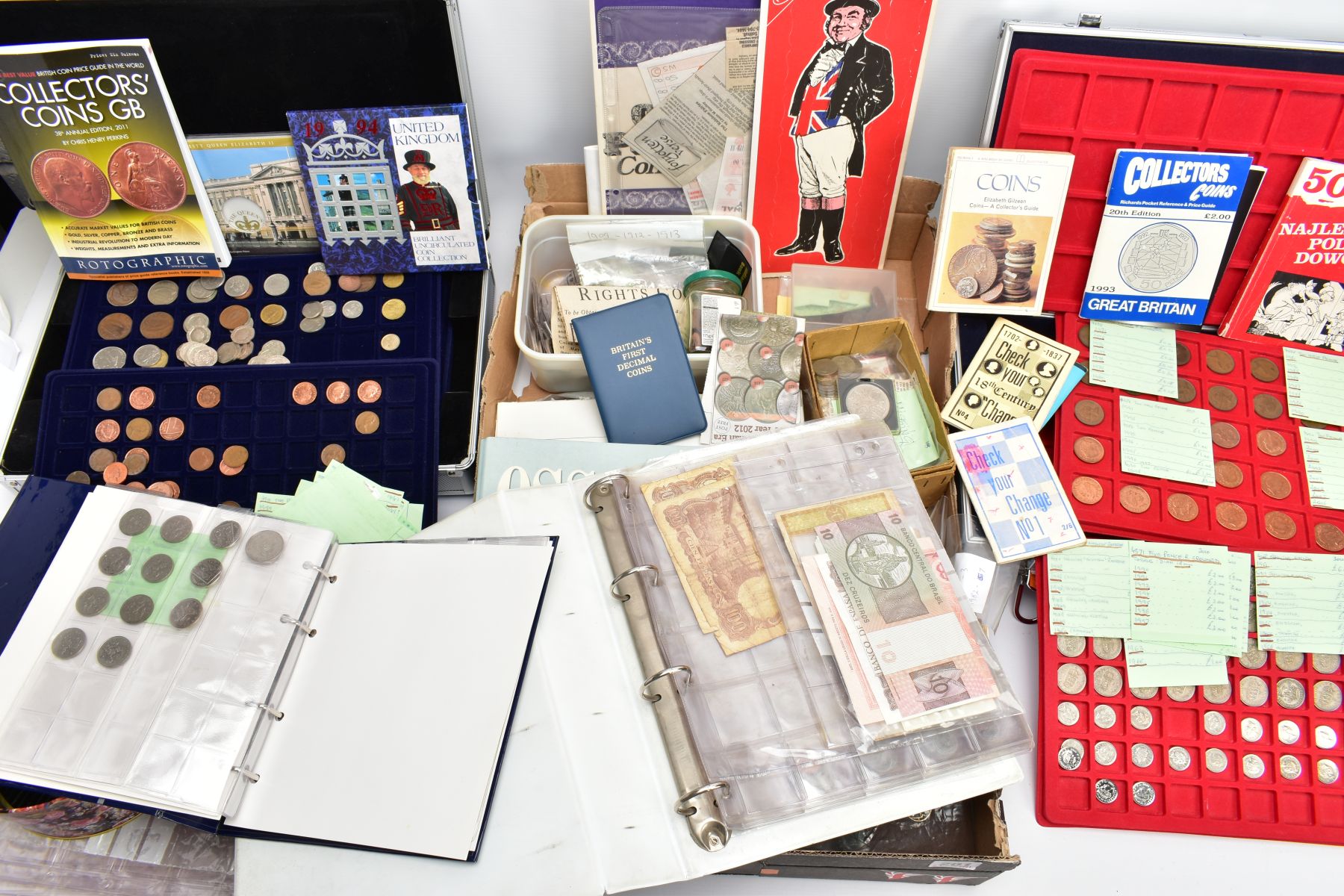 A LARGE COLLECTION OF MAINLY 20TH CENTURY COINAGE to include two coin cases, two albums, world