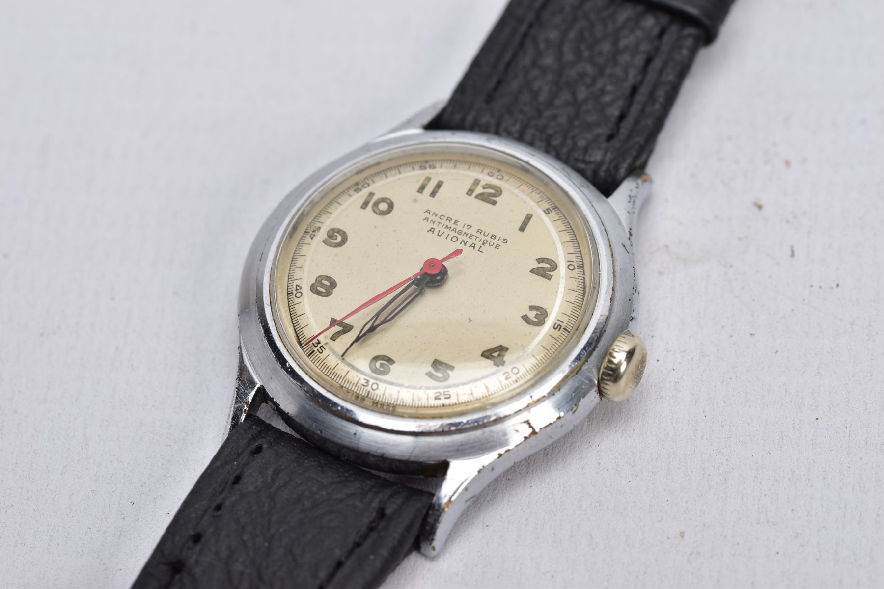 A GENTS 'AVIONAL' WRISTWATCH, hand wound movement, round champagne dial signed 'Avional