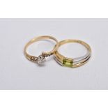 A 9CT GOLD DIAMOND RING AND A 9CT GOLD PERIDOT RING, the first ring designed with a raised