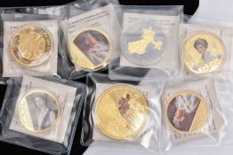 A SEVEN GROUP OF GOLD LAYERED MAINLY ROYALTY THEMED AND COLOURED COIN/MEDALS to include a Liberty