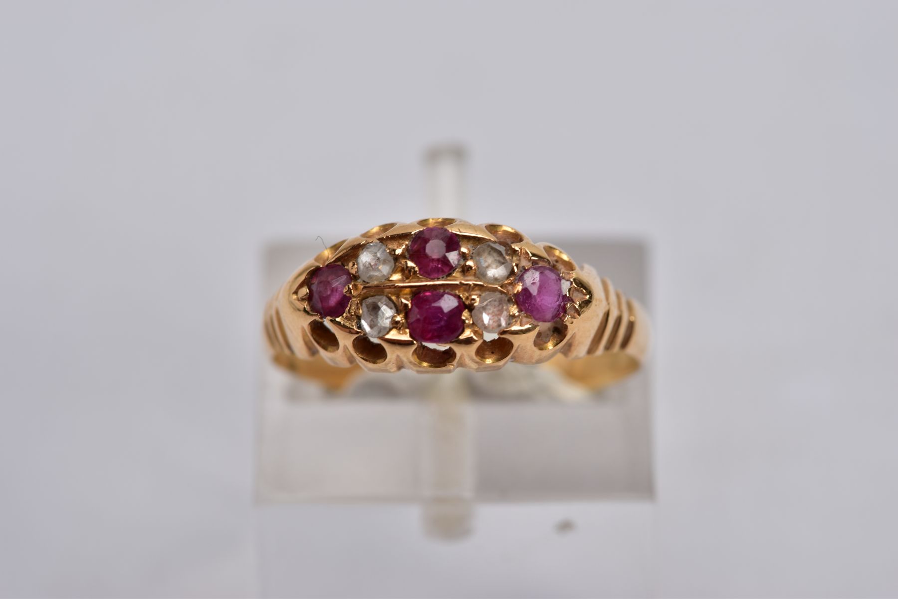 A VICTORIAN DIAMOND AND RUBY BOAT RING, set with four circular cut rubies, interspaced with four - Image 4 of 4