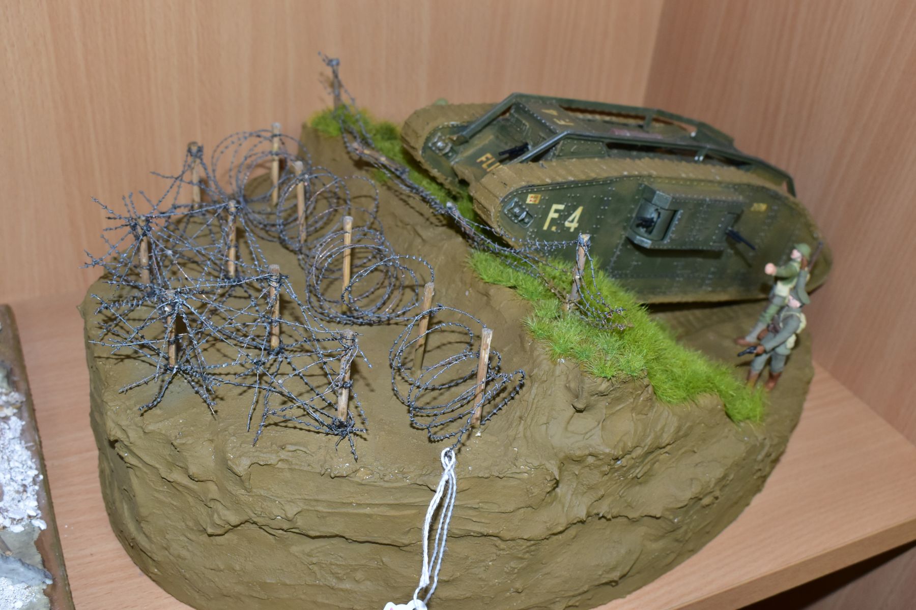 A DIORAMA OF A MK1 TANK CROSSING BARBED WIRE, approximate 1/32 scale, constructed plastic kit on a - Image 2 of 3