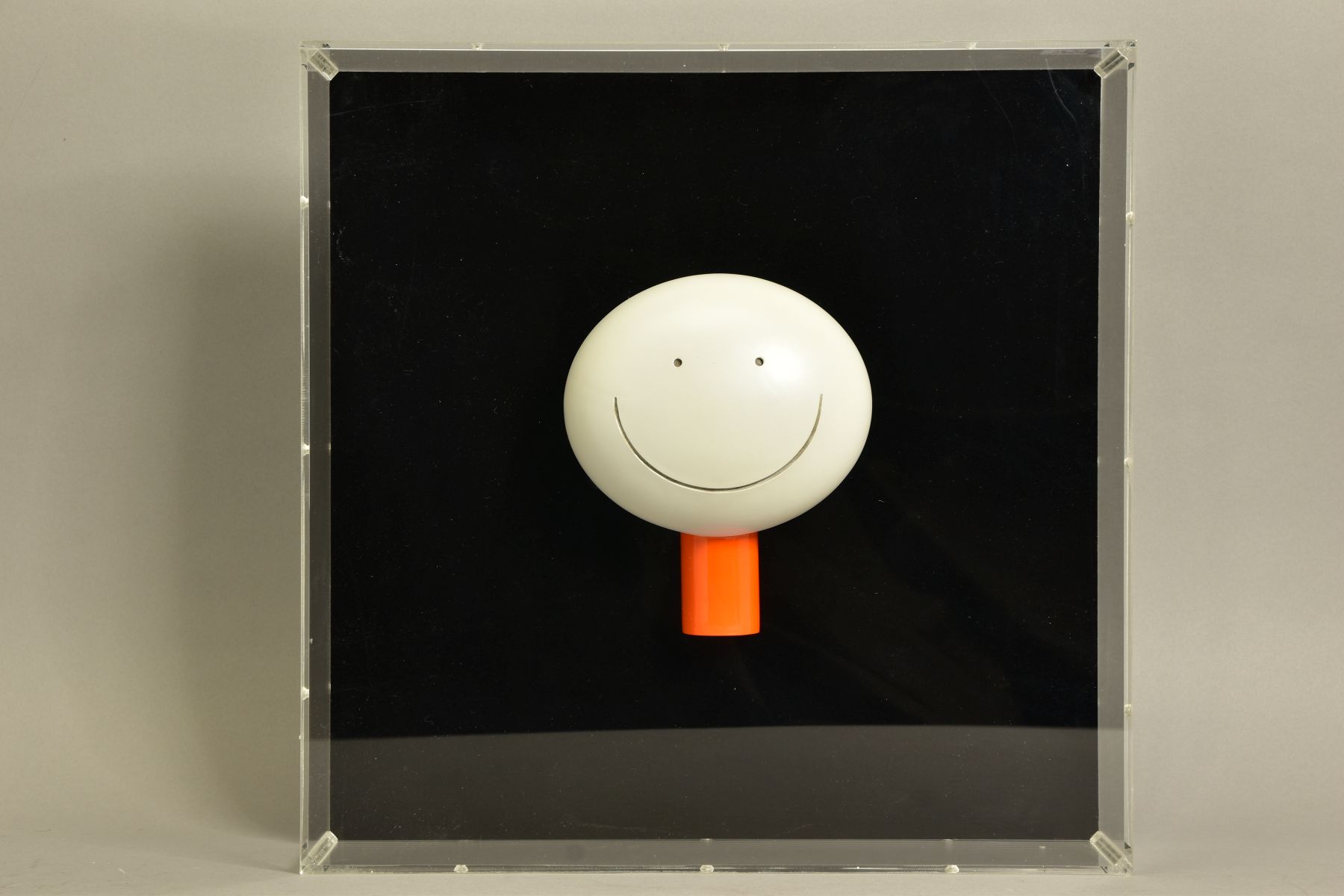 DOUG HYDE (BRITISH 1972) 'THE SMILE' a sculpture of a smiling face mounted inside a perspex box,