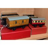 SIX BOXED HORNBY 0 GAUGE PASSENGER COACHES, 2 x No. 1 passenger coaches and passenger brake van in