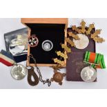 A SMALL PACKET OF ITEMS to include a boxed 20th/ounce silver Krugerrand, a 12 year St Johns