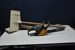 A MacCULLOCH 335 PETROL CHAIN SAW (engine pulls freely but hasn't been started) a brick hod and a
