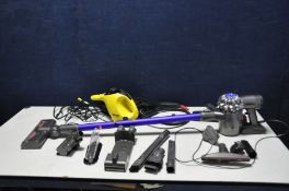 A DYSON DC59 CORDLESS VACUUM CLEANER with wall holder and various attachments and a Karcher SC1 hand