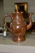 A VICTORIAN SALT GLAZED STONEWARE COFFEE POT AND COVER, having applied decoration of vine and grapes