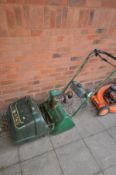 AN ATCO COMMODORE B14 PETROL CYLINDER LAWNMOWER with grass box (engine seized)