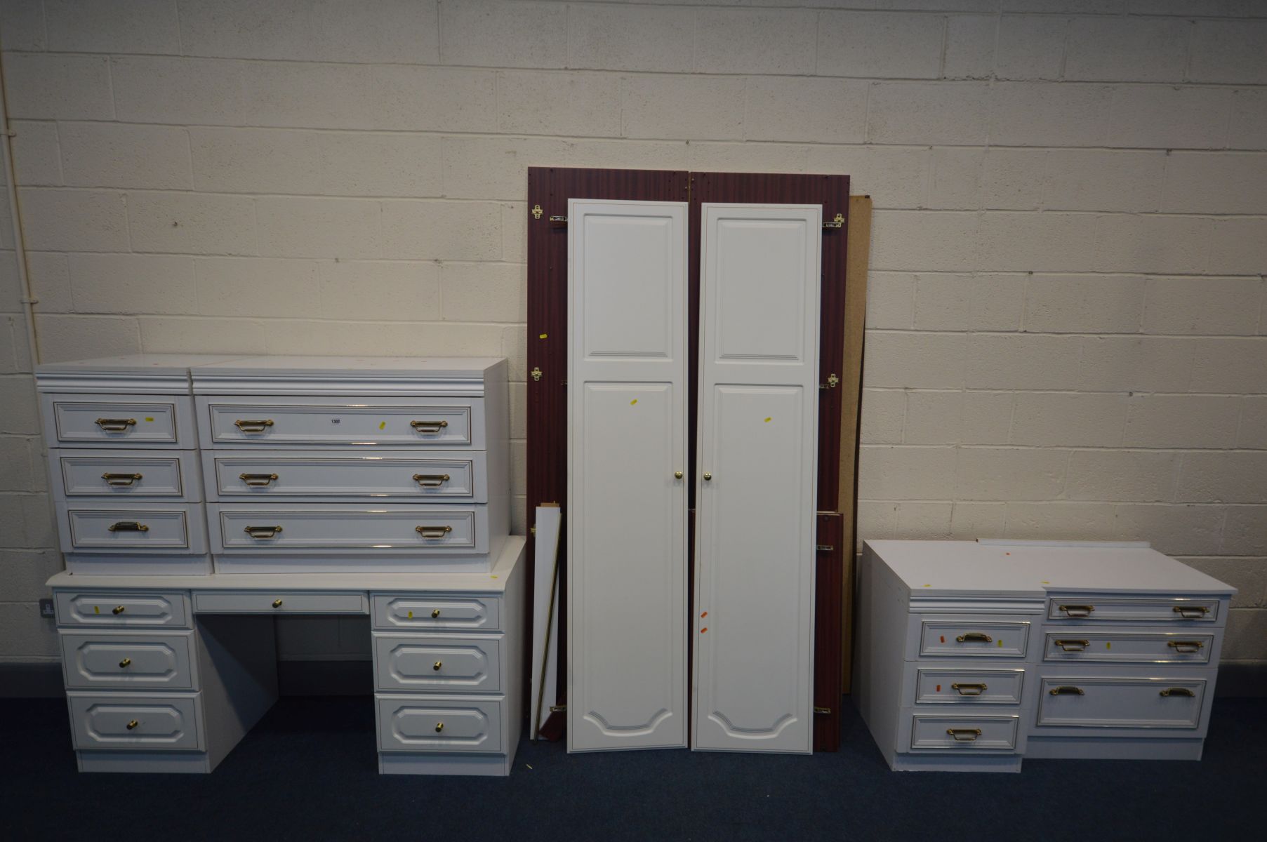 A WHITE FINISH TWO PIECE BEDROOM SUITE, comprising a double door wardrobe, width 90cm x depth 60cm x