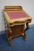 A VICTORIAN BURR WALNUT DAVENPORT, with stationary compartment above a burgundy gilt tooled