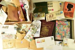 AN UNTIDY ACCUMULATION OF STAMPS in 4 albums and loose in envelopes.