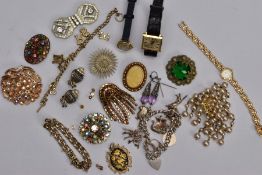 A BAG OF ASSORTED COSTUME JEWELLERY, to include a silver charm bracelet suspending seven charms in