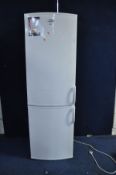 A WHIRLPOOL TALL FRIDGE FREEZER, height 188cm (PAT pass and working at 5 and -19 degrees)