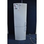 A WHIRLPOOL TALL FRIDGE FREEZER, height 188cm (PAT pass and working at 5 and -19 degrees)