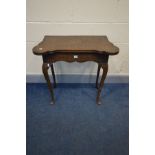 A GEORGIAN OAK FOLD OVER CARD TABLE, floral carving on tall cabriole legs, width 77cm x depth 38cm x