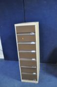 A VINTAGE METAL SEVEN DRAWER FILING CABINET CONTAINING HANDTOOLS including a Stanley No 78 plane,