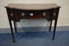 A GEORGIAN MAHOGANY SERPENTINE SIDE TABLE, the frieze with two small drawers flanking a single