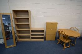 A CIRCULAR BEECH PEDESTAL KICTCHEN TABLE, diameter 100cm x height 75cm with two spindle back chairs,