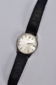 A GENTS 'SEIKO AUTOMATIC' WRISTWATCH, round discoloured silver dial signed 'Seiko Automatic,