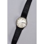 A GENTS 'SEIKO AUTOMATIC' WRISTWATCH, round discoloured silver dial signed 'Seiko Automatic,