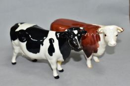 TWO BESWICK CATTLE, comprising a Hereford cow No. 1360 and a Friesian cow CH 'Claybury Leegwater'