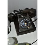 A MID 20TH CENTURY ERICSSON LM BLACK BAKELITE TELEPHONE, (Condition Report:- very worn and rusty