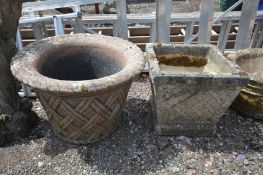 A COMPOSITE CIRCULAR PLANTER, with a lattice design, 54cm x height 67cm and a square tapered planter