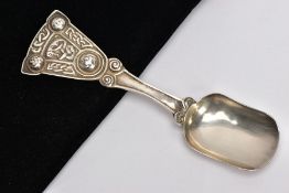 A SILVER IONA CADDY SPOON, the tapered finial with Celtic design, maker's marks for Iona,