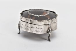 AN EARLY 20TH CENTURY SILVER AND TORTOISESHELL PIQUE TRINKET BOX, the scalloped shaped silver box