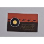 AN AUSTRALIAN KANGAROO MINIATURE GOLD COIN, unopened in original packaging, 0.5 gram 9999 gold,