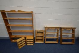 A PAIR OF MODERN PINE HANGING OPEN THREE TIER BOOKCASES, a smaller hanging bookcase, a large open