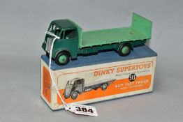 A BOXED DINKY SUPERTOYS GUY FLAT TRUCK WITH TAILBOARD, No.513, dark green cab and chassis, mid green