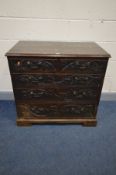 AN 18TH CENTURY OAK CHEST OF TWO OVER THREE LONG GRADUATED DRAWERS, depicting carved vines, leaves