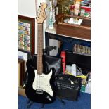 A CHINESE MADE SQUIER STRAT BY FENDER ELECTRIC GUITAR, CAE-0050360858, with a soft carry case (