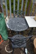 AN ALUMINIUM CIRCULAR GARDEN TABLE, diameter 68cm x height 66cm and two chairs (3)