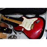 A STRATOCASTER TYPE GUITAR, with a 1960's style neck opaque fender copy decals to headstock, with