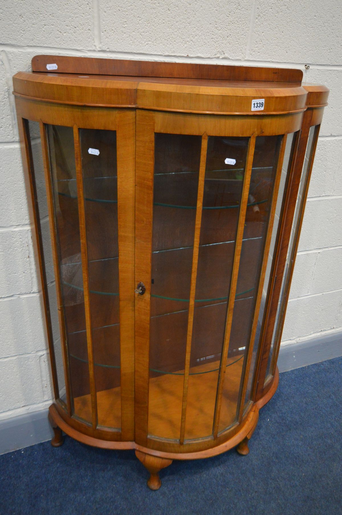 AN ART DECO WALNUT TRIPLE BOWFRONT SINGLE DOOR CHINA CABINET, three glass shelves, on cabriole legs, - Image 2 of 2